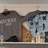 Men's T-shirt and shorts on display